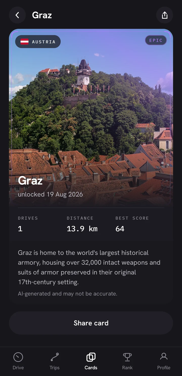 The Graz card opened: a photograph of the Schlossberg clock tower, drive stats, and a fact marked as AI-generated.